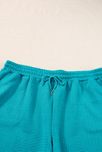Load image into Gallery viewer, Skobeloff Textured Ruffle Split Top and Drawstring Shorts